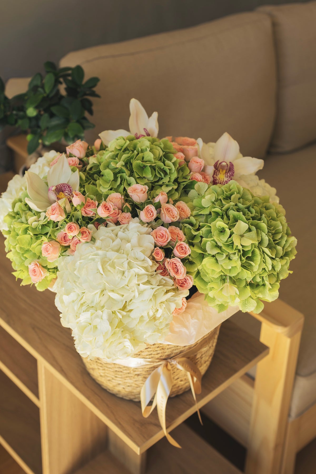 L size basket with hydrangeas, spray roses and orchids